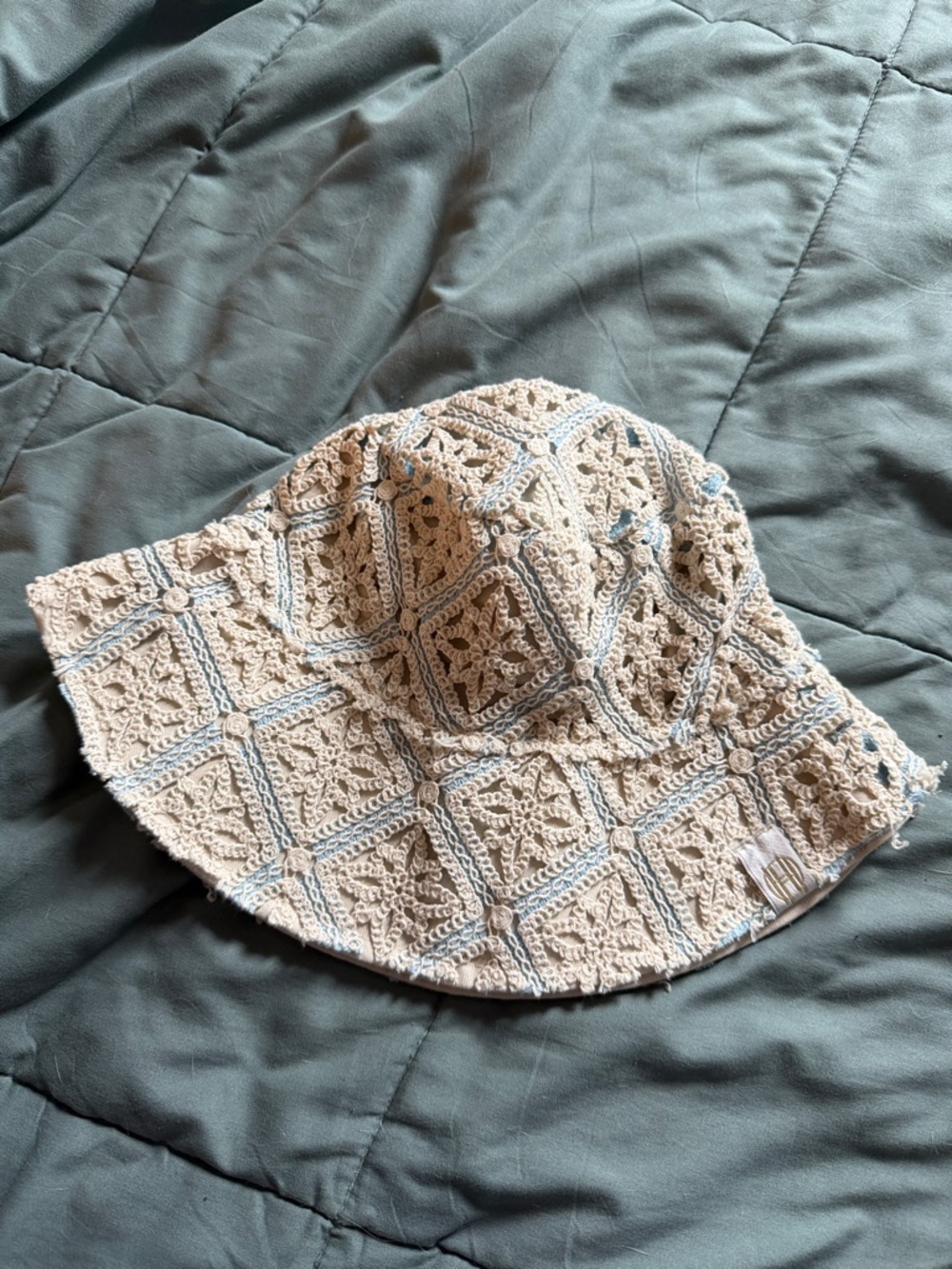 House of Harlow crochet beach bucket hat